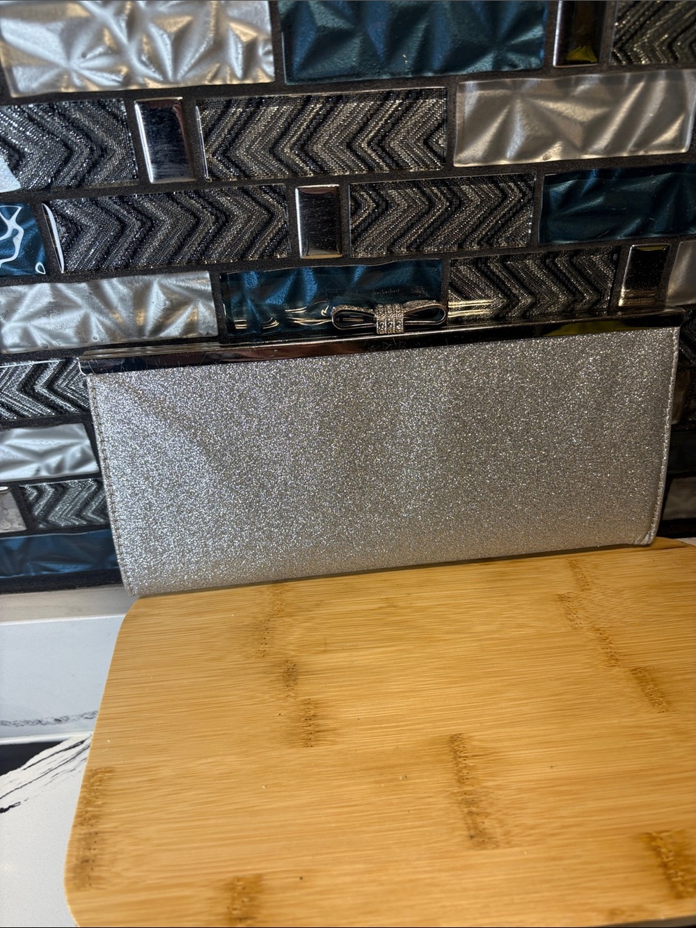 INC International Concepts Silver Glitter Envelope Clutch with Bow Accent